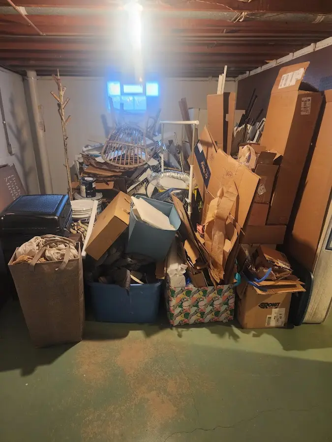 Roll-off dumpster container at job site for Cleanout Dumpster Rental in Bath